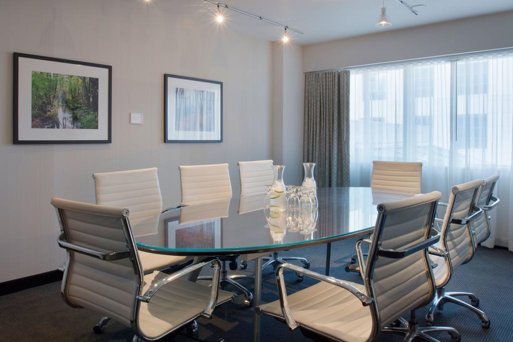 Hotel Murano Tacoma Buitenkant foto A meeting room at the firm's New York City headquarters